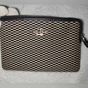 Coach black and tan wristlet